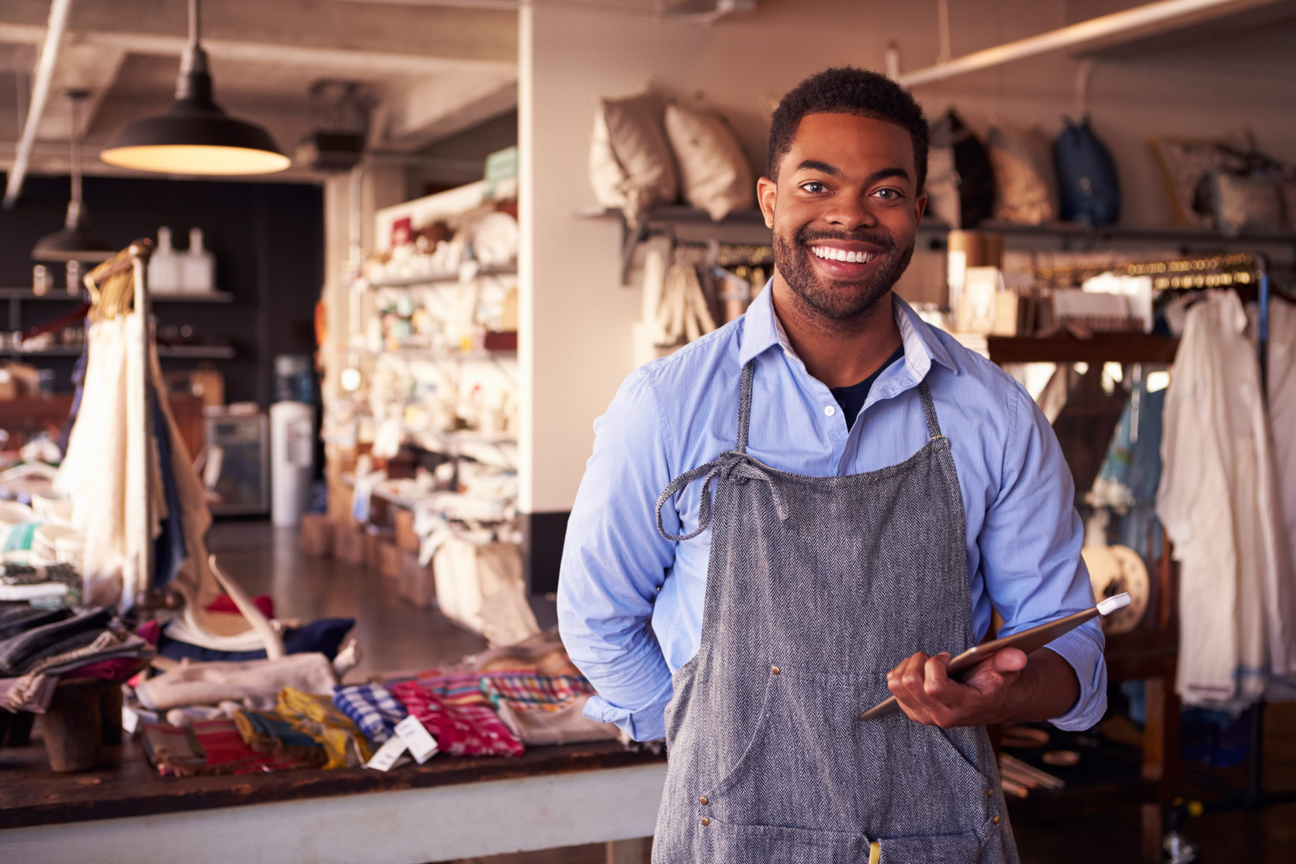 Shop owner with ipad